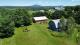 Wotton (Estrie): Fermette de 54 acres,27 acres en culture, fort, garage et grange