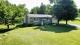 Wotton (Estrie) : Maison avec devanture en pierre des champs, grand terrain intime de 35 714 pi2,